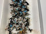 a white plate with a bunch of small legos in it