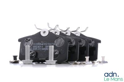 three black switches with screws on each side of them on a white surface