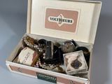 a box with various items in it sitting on a table