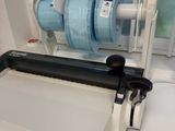 a machine that is sitting on a table in front of a window