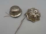 pair of antique silver plated spoons and ladle