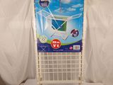 a picture of a plastic laundry basket on a stand