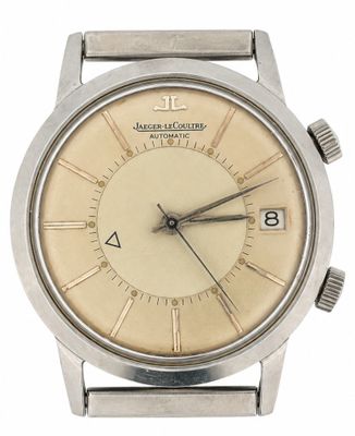 a close up of a wrist watch on a white background