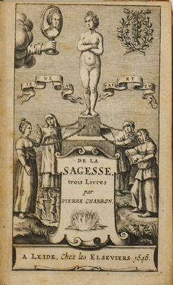un vieux livre sur lequel figure le dessin d'un homme debout au sommet d'une statue