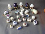 many different types of porcelain objects on the table
