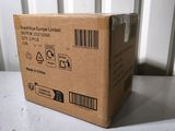 a box that is sitting on a table with a barcode on it