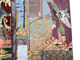 two pieces of fabric with a picture of a man and a woman on them