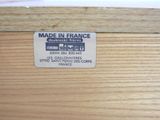 a label on a piece of wood that says made in france