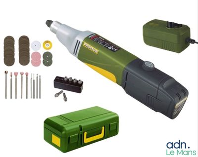 une image représentant un outil électrique vert et noir contenant des outils