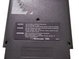 the back of a nintendo game cartridge with a sticker on it