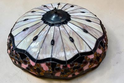 a decorative box with a pink and black design on it