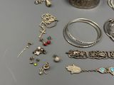 many different types of jewelry on the table