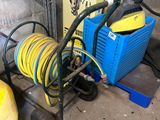 a cart with a hose and a cart with a hose attached to it
