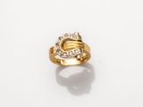 a gold and diamond ring, by business