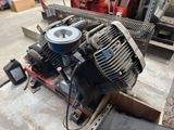 a small engine that is sitting on the ground