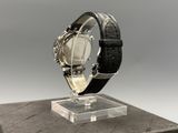 an image of a wrist watch on a display on a table