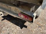 an image of a truck that is parked on the side of the road