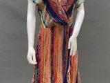 a mannequin wearing a multicolored dress on a mannequin mannequin