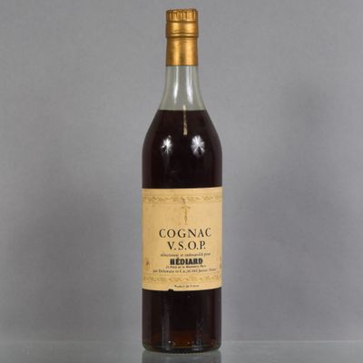 a bottle of wine that is sitting on a table