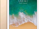 an apple ipad air is shown with a gold screen and a white background