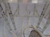 a glass table that has a towel on it