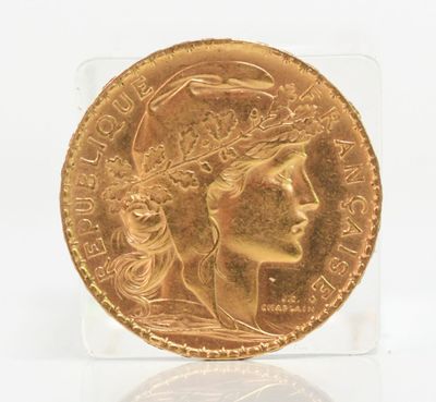 an image of a gold coin with a woman ' s face on it