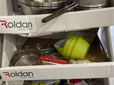 a small refrigerator with a lot of food inside of it