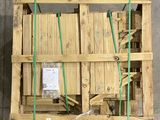 wooden pallets are stacked on top of each other in a warehouse