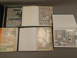 many different types of stamps on the pages of a book