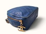 chanel blue quilted leather cosmetic case with gold hardware