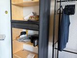 an image of a closet in a small room