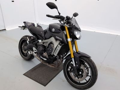 a motorcycle that is parked in a garage