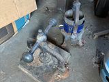 an image of a garage with tools on the floor