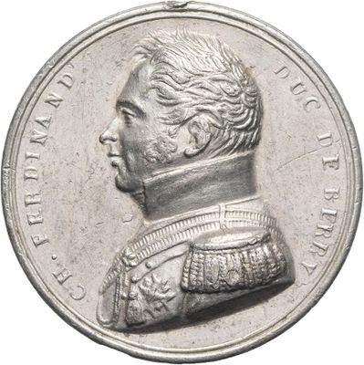 a close up of a coin with a portrait of a man on it