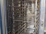 a large oven that has a lot of racks inside of it