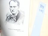 someone is holding a book with a drawing of a man in a bow tie