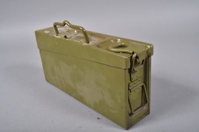 a small metal box that has a handle on it