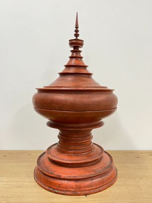 an image of a wooden object on top of a wooden table