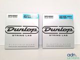 two boxes of dunlop strings are sitting next to each other