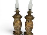 pair of antique brass candlesticks with asian scenes