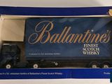 an image of a blue box with a black truck in it