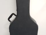 the guitar case is black and has a black handle