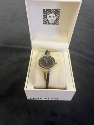 an image of a watch in a box on a table
