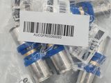 a bunch of silver and blue metal connectors in a plastic bag