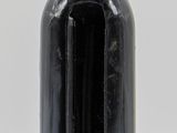 a bottle of wine that is sitting on a table