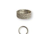a close up of a ring and a ring on a white background