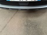 a car that has a license plate on the front of it