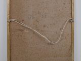 an image of a picture of a piece of cardboard with a string attached to it