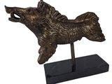 an image of a bronze statue of a dog on a marble base