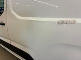 a white van with a sticker on the side of it